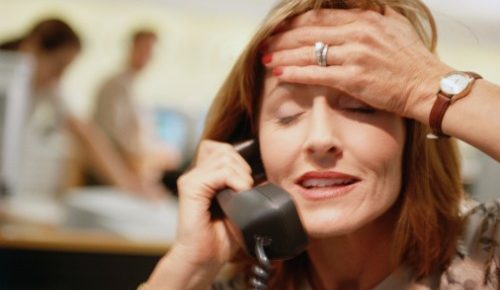 businesswoman-on-telephone-picture-id477859103-500x290